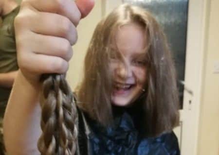 Eden May McPherson after her hair cut. EMN-190807-161413001