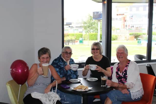 Some of the first customers enjoying a cuppa at the new Cafe Magna in Skegness.