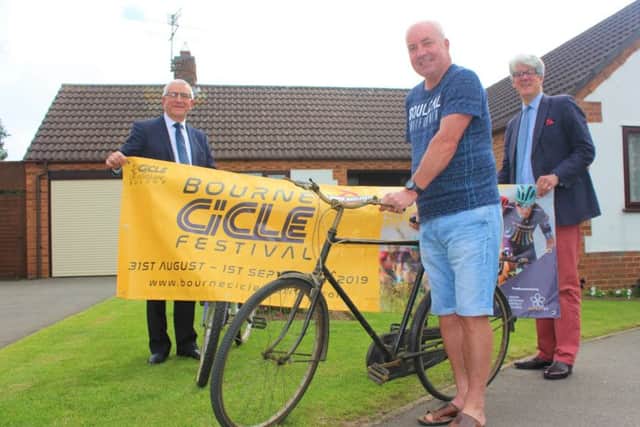 John Baldwin and his fathers bike, with (left) Paul Stokes, SKDC corporate operations lead and (right) Andrew Norman, Head of Visitor Economy for InvestSK. EMN-190907-164436001