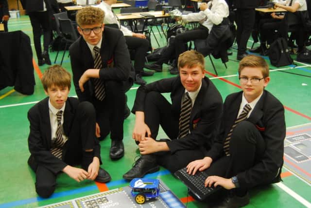 Students from Carre's Grammar School programming robots during their STEM day. EMN-190716-003516001
