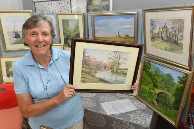 Digby Fayre. Anne Barnham of Digby with her art work EMN-190807-114200001