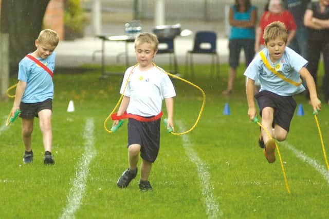 Pictured in the skipping race, from left, Harry Edwards, Adam Good and Kian Mothers.