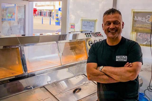 Sezign 'Sam' Cilek behind the counters in Sams Tratidional Fish and Chip Restaurant. Picture: Quinstone UK