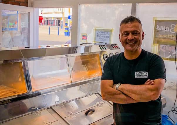 Sezign 'Sam' Cilek behind the counters in Sams Tratidional Fish and Chip Restaurant. Picture: Quinstone UK