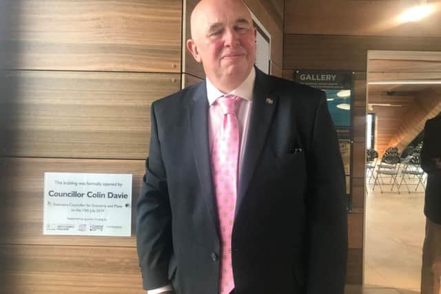 Lincolnshire County Council's executive member for economy and place Coun Colin Davie unveils a plaque to mark the official opening of the North Sea Observatory.
