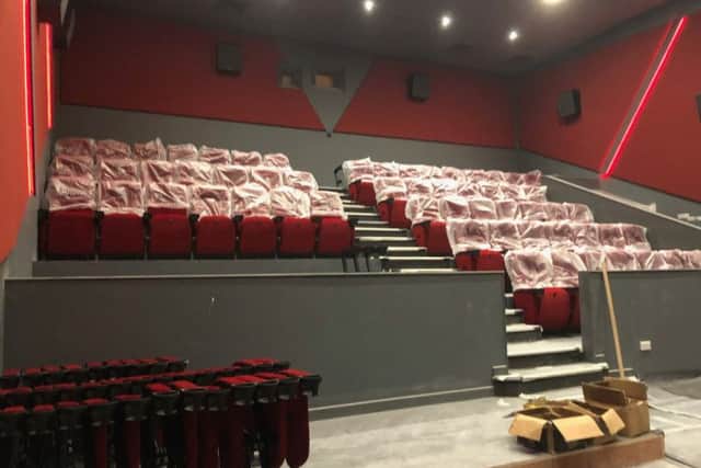Seat installations in one of the screens at Savoy Cinema, in Grantham. EMN-191107-100231001