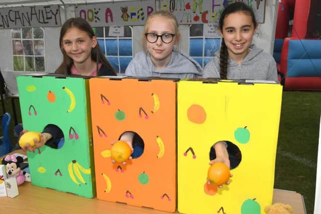 Sleaford RC School, family fun day. L-R Kelsie Payne 10, Kitty Woods 11, Beatrice Allen 11. EMN-190715-232549001