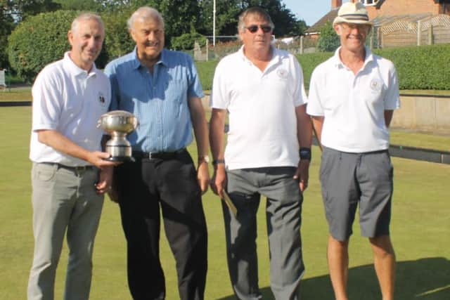 The winning Tealby team of G. Thornally, U. Reid and D. Heath with John Broddle (second left). Picture: Wes Allison EMN-190715-164039002