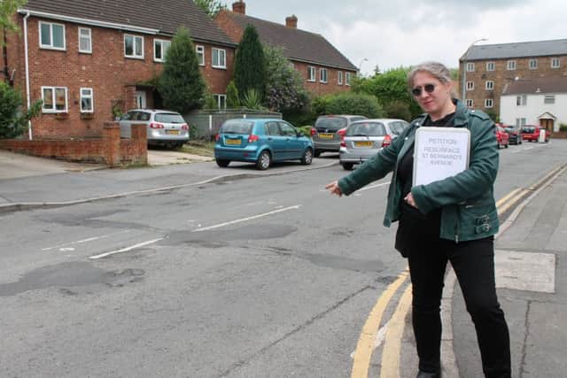 Coun Ros Jackson led the campaign for repairs on St Bernards Avenue.