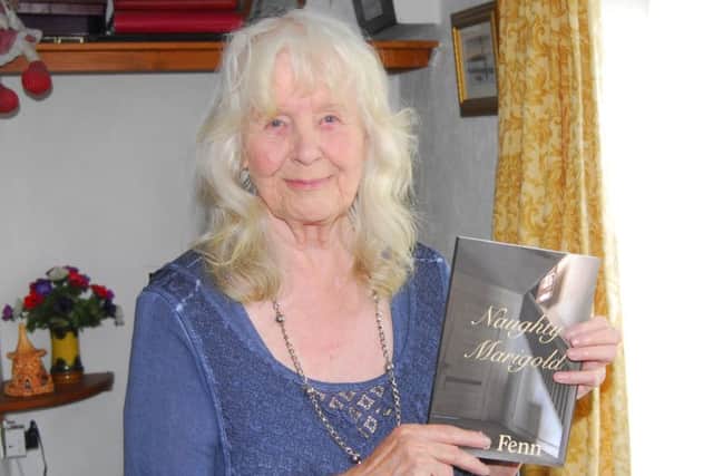 Lois Fenn of Ruskington, with her new book. EMN-190716-003409001