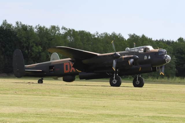 A Lancaster bomber on a taxi run - share your wartime memories with the IBCC. EMN-190716-175250001