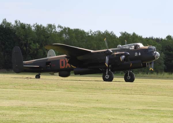 A Lancaster bomber on a taxi run - share your wartime memories with the IBCC. EMN-190716-175250001