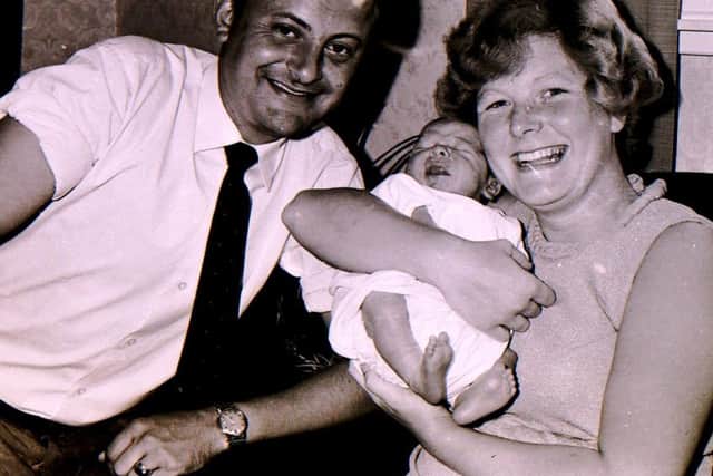 New moon landing baby Gary Wilson with his proud parents 50 years ago after they won a competition in the Sleaford Standard. EMN-190717-172811001