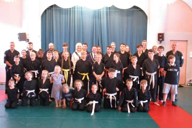 Club photo with the Mayor.