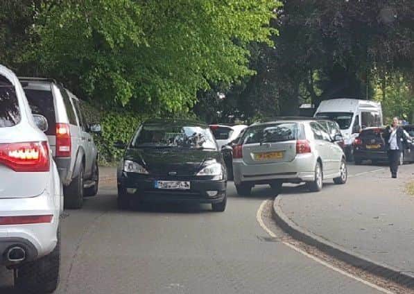 Parking on Bowl Alley Lane. EMN-190717-151910001