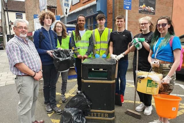 Gary Denniss (left) with some members of the NCS group and their staff mentor Abi Allen.