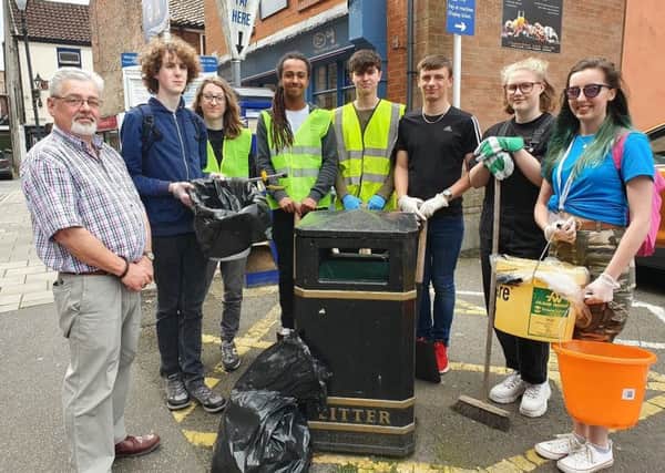 Gary Denniss (left) with some members of the NCS group and their staff mentor Abi Allen.
