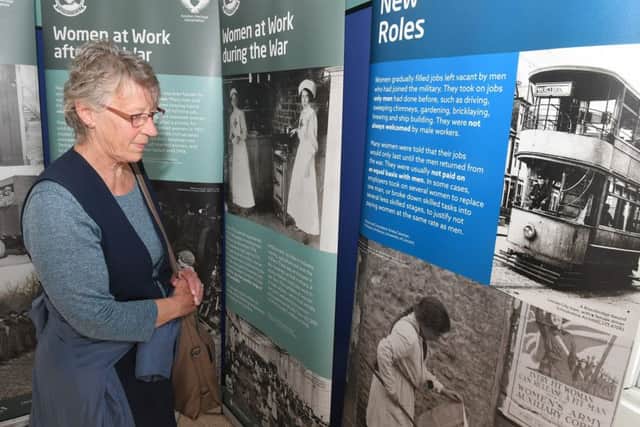Alison Laing viewing the exhibition in the Old Police Station EMN-190721-220602001