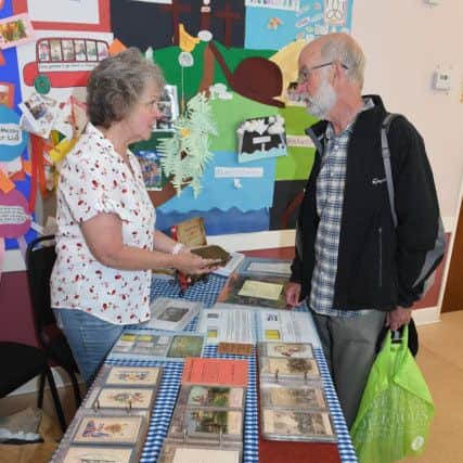 Centenary of Peace Day at Market Rasen. Jill Appleyard and Michael Newton in the Church Rooms. EMN-190721-220500001