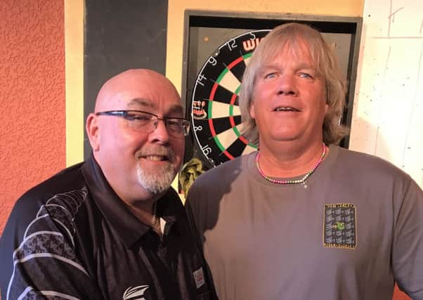 BDO and PDC pro Tony O'Shea took on local players at the SeaviewPub Skegness this weekend. He is pictured with Rob Pomeroy.