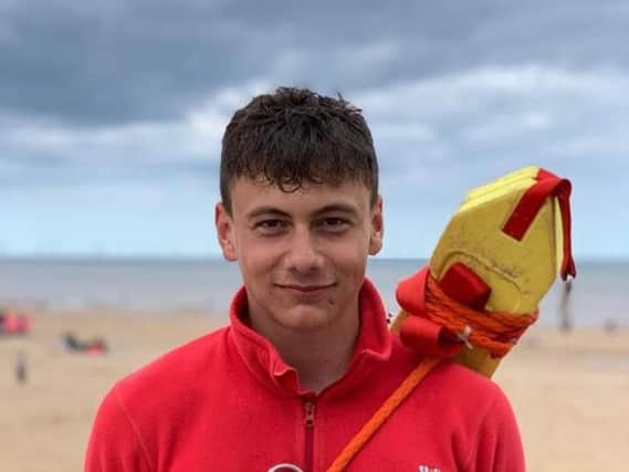 RNLI lifeguard Lewis has been praised after rescuing a teenager.