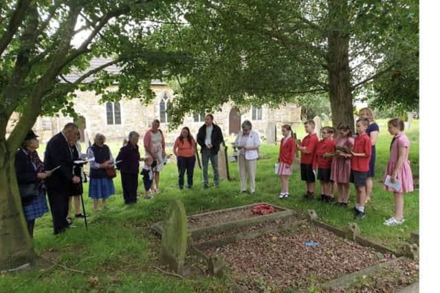 The commemoration service in Middle Rasen graveyard EMN-190722-134303001