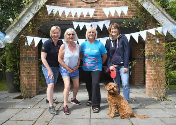 Denise Haynes, Lesley Lock, Carolyn Dean and Suzy Stack with dog Paddy.