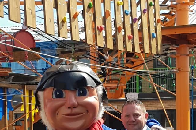 Mayor Coun Mark Dannatt with the Jolly Fisherman at Altitude 44.