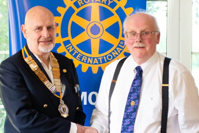 This year the new president for Louth is Richard Jones, who is seen accepting his chain of office from outgoing president Jim Randall.