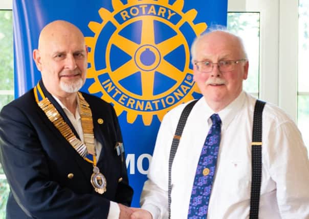 This year the new president for Louth is Richard Jones, who is seen accepting his chain of office from outgoing president Jim Randall.