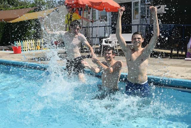 L-R Daniel Doherty, Joshua Pace and Logan Bovington at Billinghay Swimming Pool. EMN-190726-092627001
