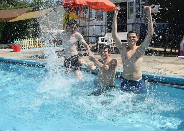 L-R Daniel Doherty, Joshua Pace and Logan Bovington at Billinghay Swimming Pool. EMN-190726-092627001