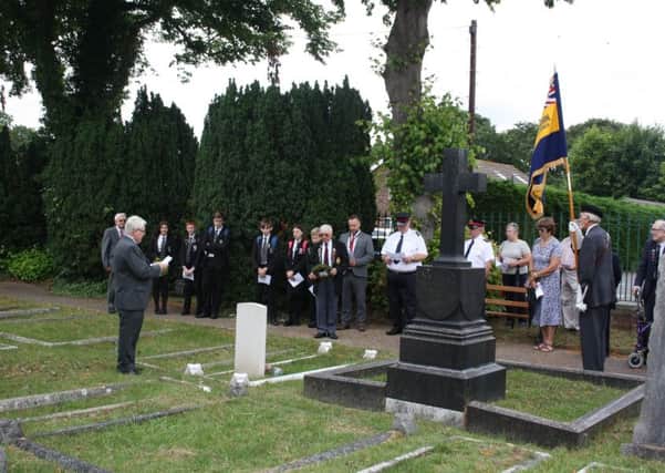 Peace Day commemoration at Market Rasen Cemetery. 
Photo courtesy of De Aston School EMN-190727-085622001