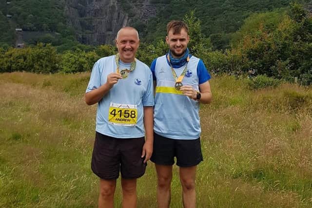 Andy and stepson Harlan in Wales EMN-190729-124010002