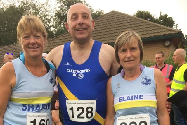 Sharon and Elaine with Karl Holmes of Cleethorpes AC at the Scunthorpe 10k EMN-190729-124021002