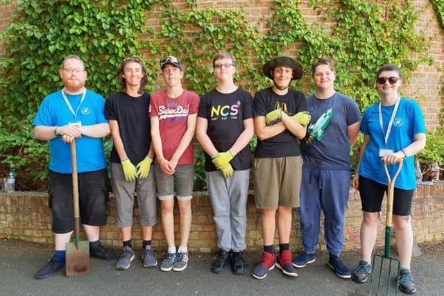 Simon and Rhiannon (blue shirts) alongside some members of the NCS group at the Trinity Centre last week.