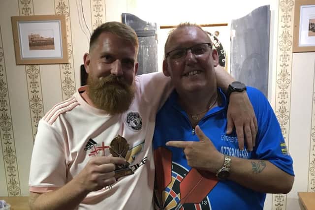Qualifier winner Joby Booth, left, with organiser Chris Fletcher.