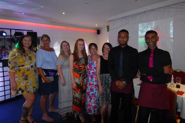 Friends, family and managers of the Agra in Sleaford at the Millie's Ocean Clean Up fundraising buffet event. EMN-190726-230744001