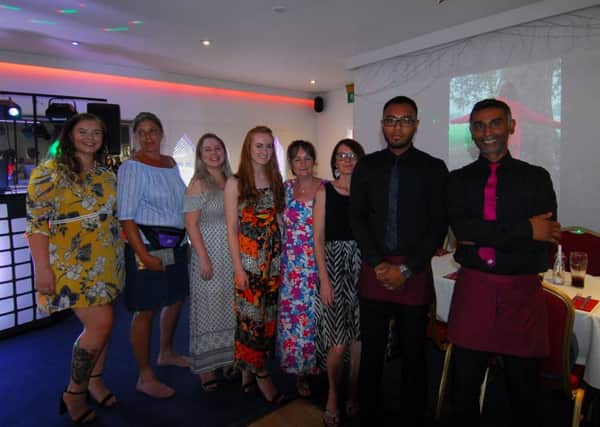 Friends, family and managers of the Agra in Sleaford at the Millie's Ocean Clean Up fundraising buffet event. EMN-190726-230744001