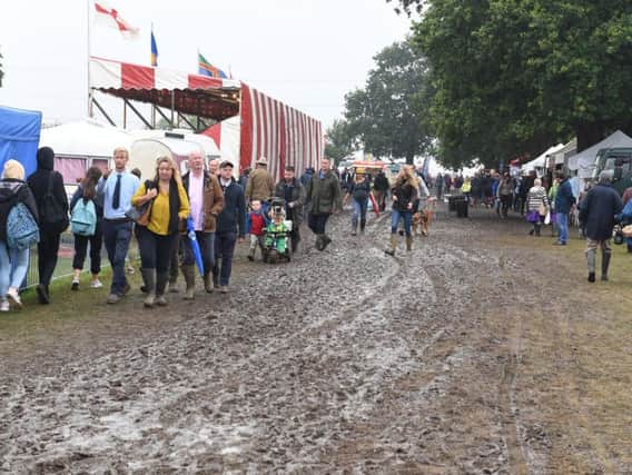 Muddy under foot for Heckington Show visitors on Sunday.
