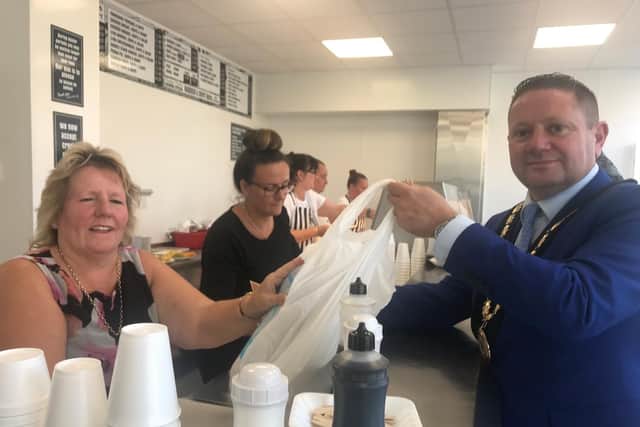You can't miss out on chips on 'fish Friday, especially when you are the Mayor of Skegness. Coun Mark Dannatt collects his order from the owner of Seaview Fisheries, Marie Ramsay.