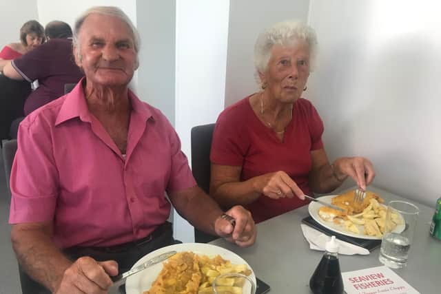 Customers celebrating the re-opening of Seaview Fisheries.