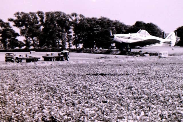 Aerial crop spraying near Sleaford in the 1960s. EMN-190826-164504001