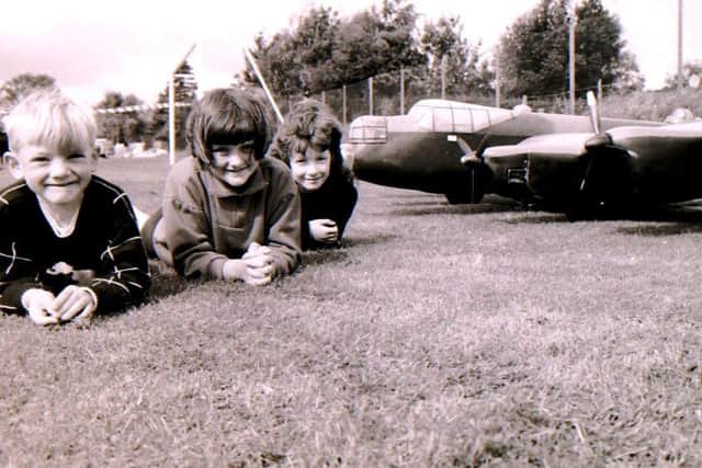 Were you one of these three youngsters admiring the model Lancaster at Helpingham Show in 1994? EMN-190826-143246001