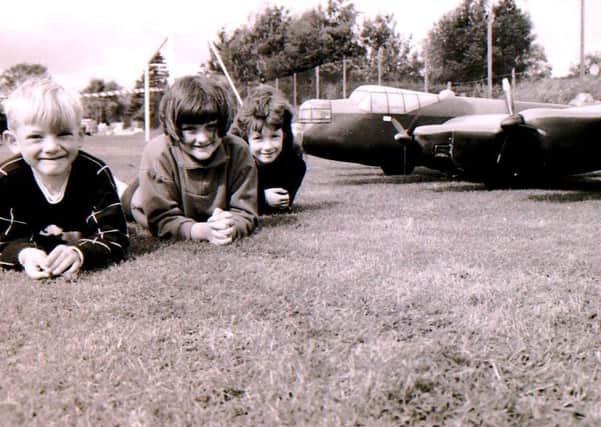 Were you one of these three youngsters admiring the model Lancaster at Helpingham Show in 1994? EMN-190826-143246001