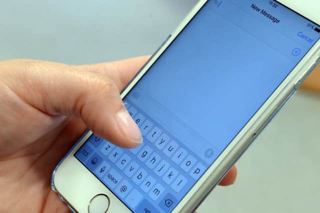 stock - mobile phone text - texting STO-170630-143417001