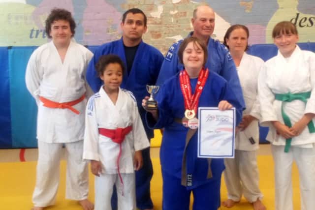 Georgina (centre) with other Judo club members.