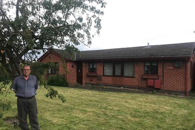 Graham Coupland outside the property in Candlesby which has been bought by Blue Mountain Homes.