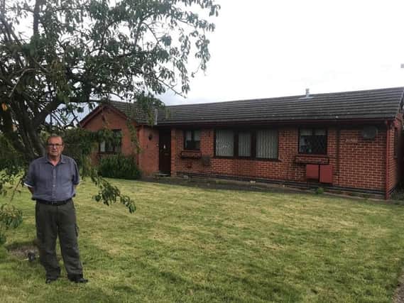 Graham Coupland outside the property in Candlesby which has been bought by Blue Mountain Homes.