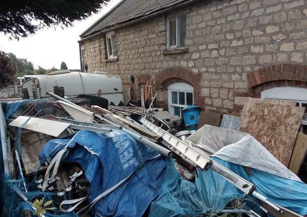 MP Dr Caroline Johnson has called for authorities to take action over Metheringhams horror house. EMN-191009-131738001